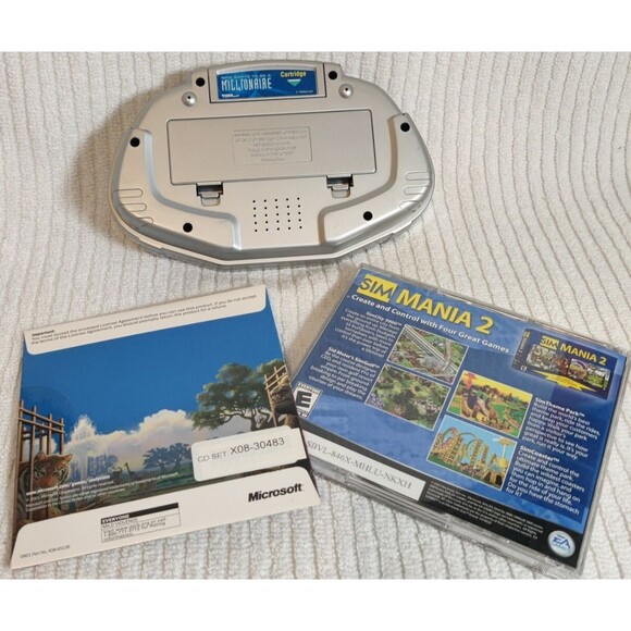 Vintage Lot of 3 items-One Electronic Handheld Game and Two PC Games-Pre Owned - Picture 2 of 16